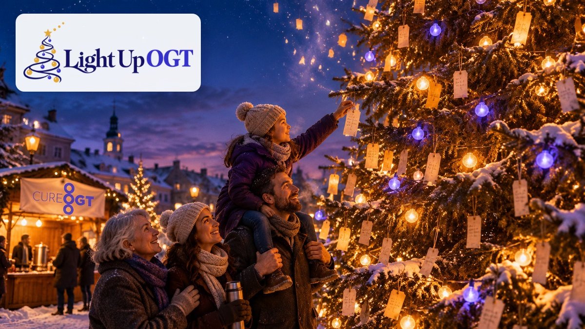 Light Up OGT 2026: a family hangs a wish on a lit tree